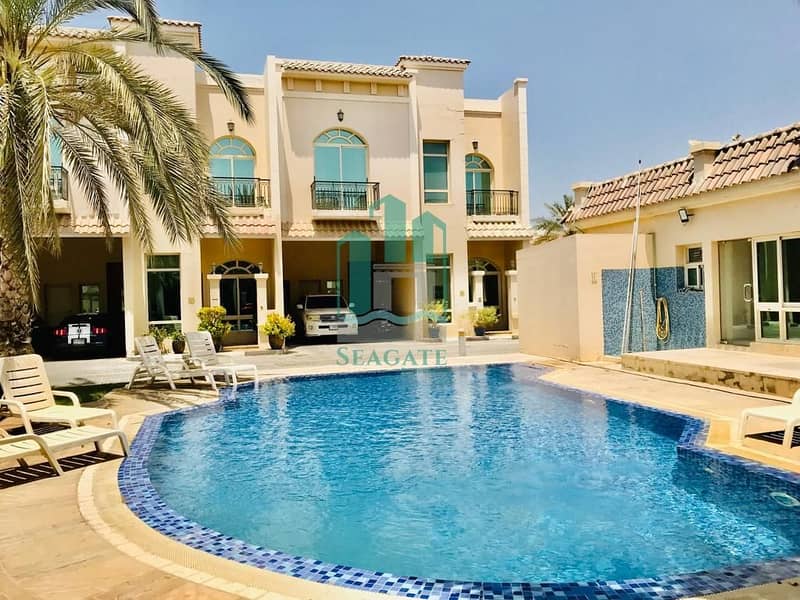 Spacious and bright 5 bedroom plus maid compound villa in Al Barsha 1