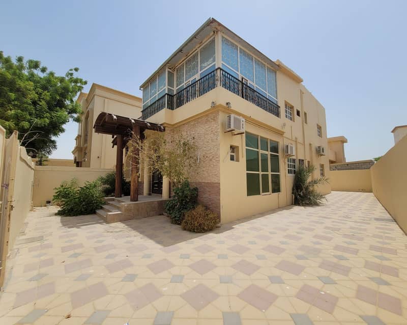 Villa for sale in Al Mowaihat with water and electricity, a great location and a great price
