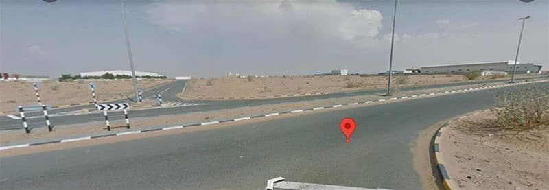 ارض تجارية  للبيع في منطقة الإمارات الصناعية الحديثة، أم القيوين - 87100 SQ FT CORNER PLOT ON MAIN 60 METER ROAD IN EMIRATES MODERN INDUSTRIAL UMM AL QUWAIN