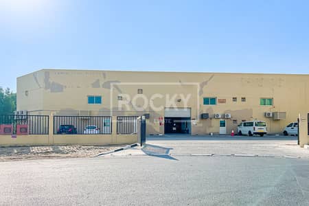 Warehouse for Sale in Dubai Investment Park (DIP), Dubai - Compound Warehouse|Rented|7% ROI