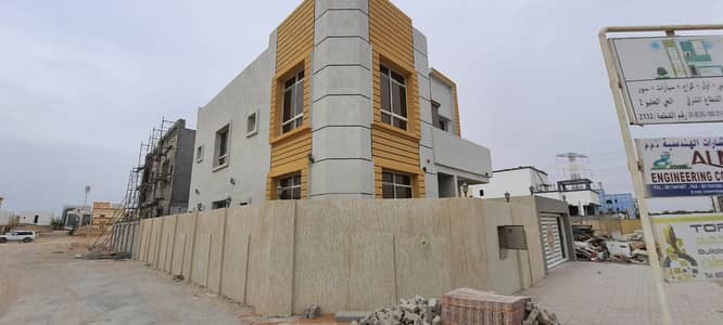 5 Bedroom Villa for Sale in Al Helio, Ajman - Villa corner of two streets at a very attractive price, excellent finishing, 5 rooms, freehold for all nationalities