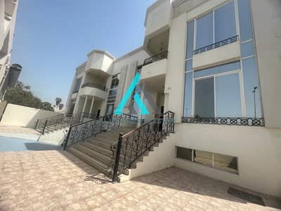14 Bedroom Villa for Rent in Al Karamah, Abu Dhabi - 2 COMBINED VILLAS AVAILABLE FOR RENT ON THE MAIN ROAD.