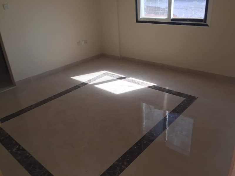 For rent in Ajman, Al Hamidiyah, an apartment of 2 rooms and a hall