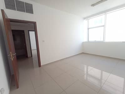 1 Bedroom Flat for Rent in Al Nahda (Sharjah), Sharjah - Front of Bus stop F 22 F 24- Dubai Sharjah border | 1 month free - Easy Payment | family building