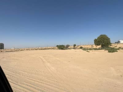 Plot for Sale in Al Suyoh, Sharjah - Commercial land for sale in Al Raqiba area, Al Suyouh suburb behind the Tilal project