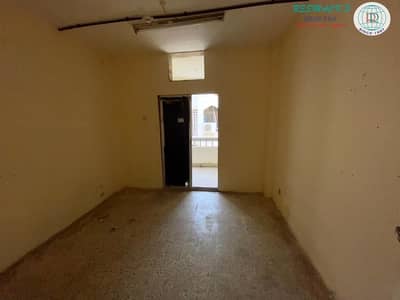 1 Bedroom Apartment for Rent in Al Ghuwair, Sharjah - 1 B/R HALL FLAT WITH BALCONY EXCLUSIVE FOR BACHELOR IN AL GHUWAIR AREA, SOUQ AL GHUWAIR