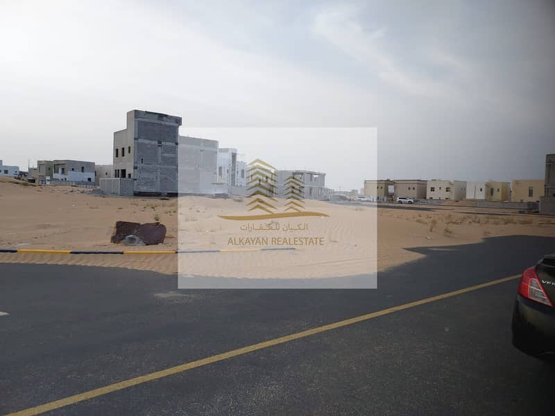 For sale, corner land, two streets, in Ajman, Al Zahia, a very special location
