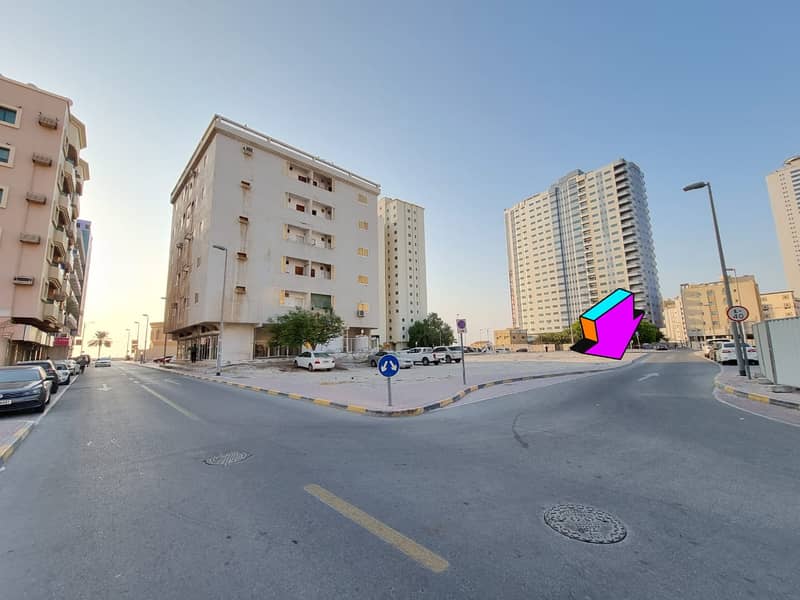 For sale residential commercial land in the Emirate of Ajman, Al Nakhil area 2, a privileged location on a main street