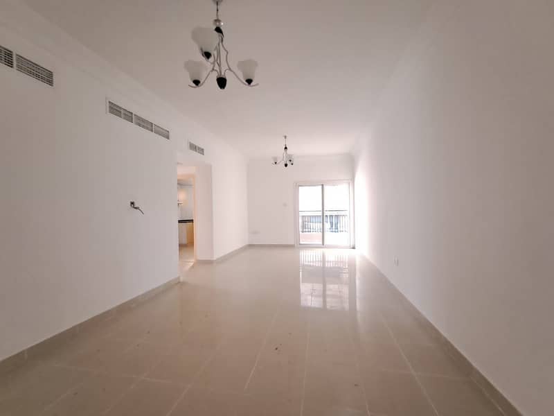 Prime location (45 days Free) 2Bhk rent 30k to Open hall with balcony very close to Al Nahda park