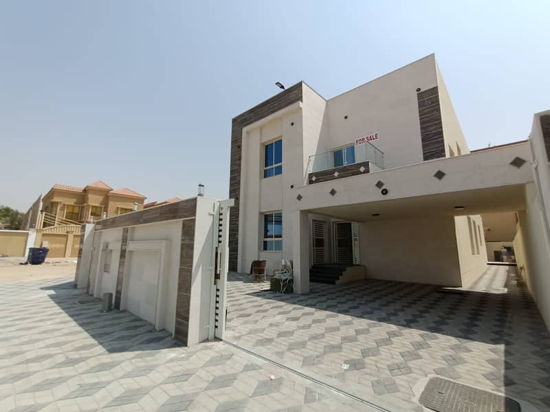 Corner villa on two streets of the most luxurious villas in Ajman with European design and super deluxe finishing at a special price with the possibil