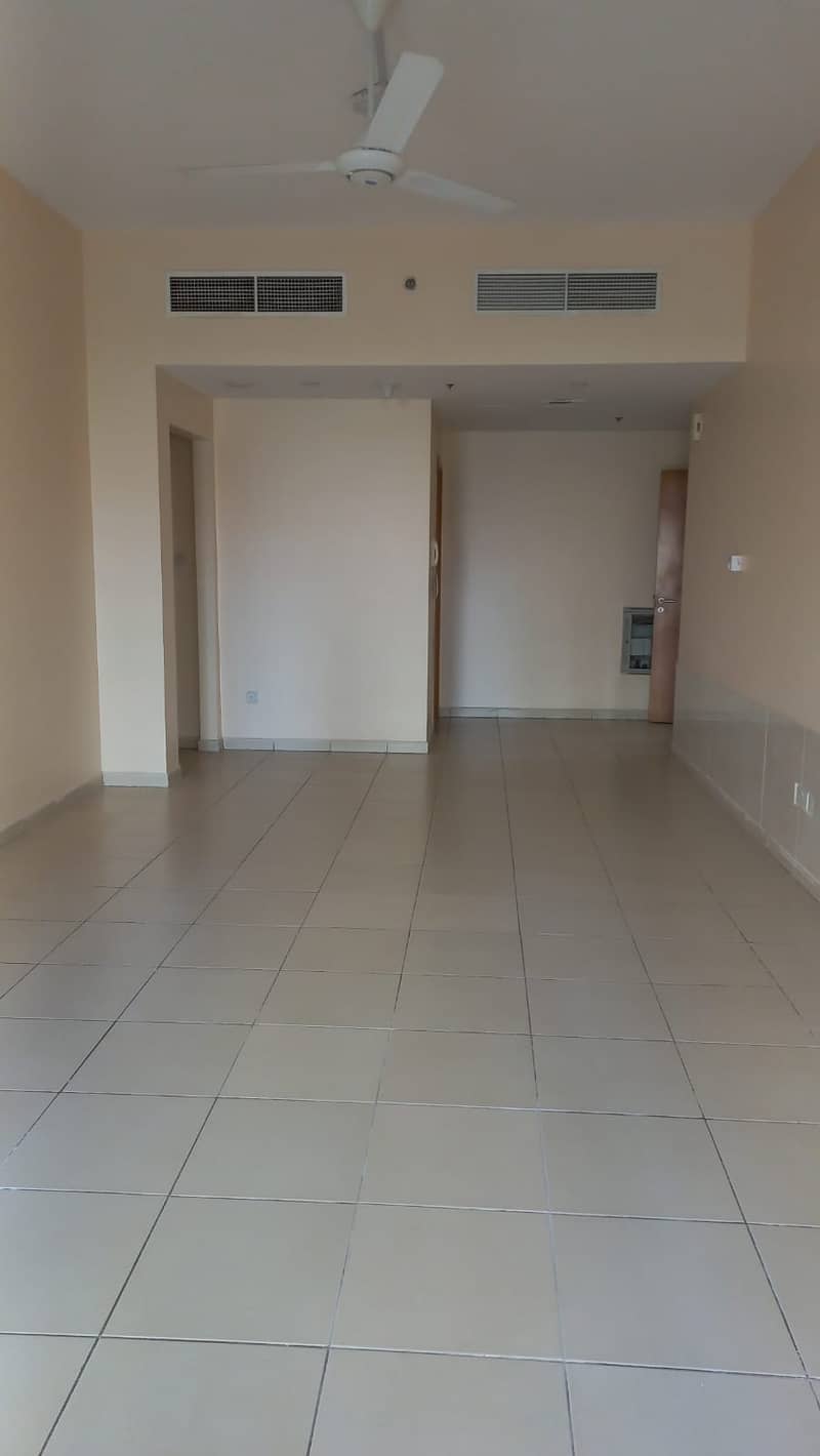 1 BHK CLOSE KITCHEN GARDEN VIEW AVAILABLE FOR RENT IN AJMAN ONE TOWERS WITH PARKING.