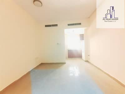 Studio for Rent in Muwaileh, Sharjah - 60 days free//9k//with separate kitchen central a. c close to Ambassder school in muwaileh sharjah