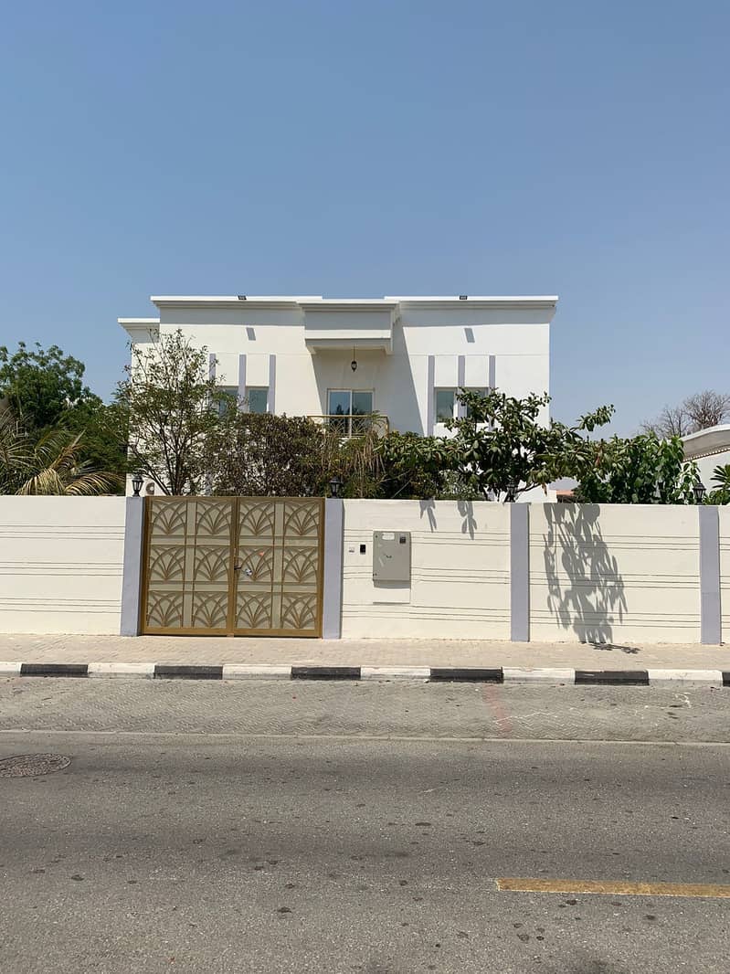 Prime Location! - Villa for Sale in Al Jazzat area in Sharjah - (Four master bedrooms)
