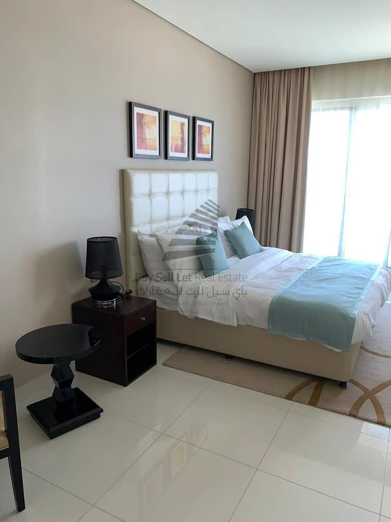 FULLY FURNISHED STUDIO WITH BALCONY AND COMMUNITY VIEW
