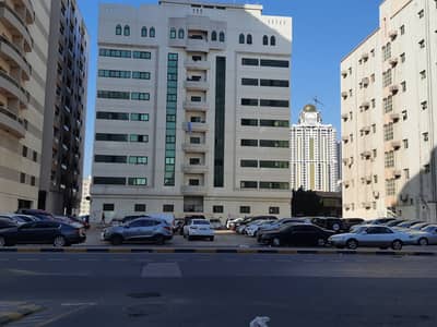 Plot for Sale in Al Nuaimiya, Ajman - For sale commercial land, King Faisal Street, very excellent location