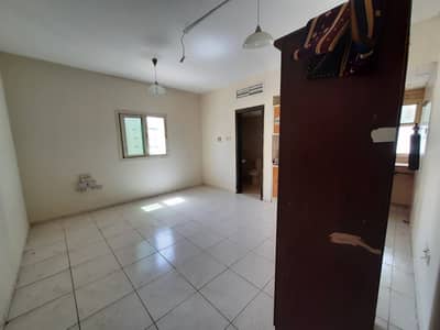 Studio for Rent in Al Mahatah, Sharjah - 1 MONTH FREE | SPACIOUS STUDIO WITH CENTRAL AC & GAS ONLY 13k