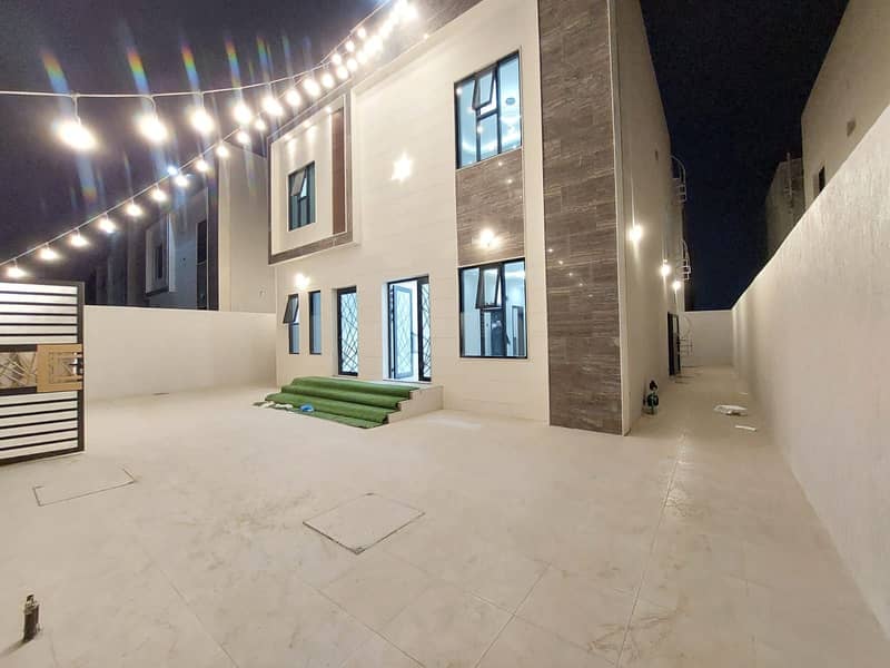 For sale villa, including fees and no fees, down payment, a villa with a stone facade, near the mosque, with personal finishing and building, and the