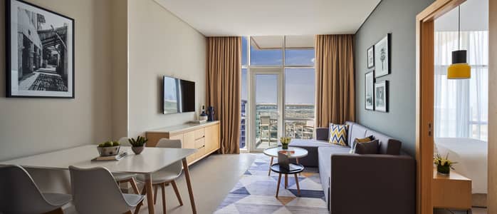 شقة 1 غرفة نوم للايجار في مثلث قرية الجميرا (JVT)، دبي - شقة في فندق وأبراج ترحاب مثلث قرية جميرا حي رقم 3 مثلث قرية الجميرا (JVT) 1 غرف 85000 درهم - 6038662