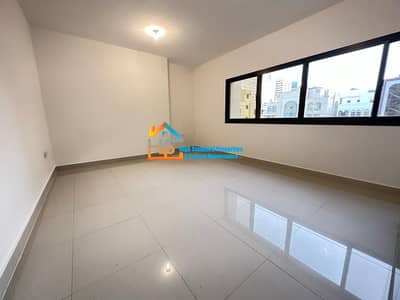 2 Bedroom Flat for Rent in Hamdan Street, Abu Dhabi - Splendid 2bhk with Spacious Saloon And Balcony