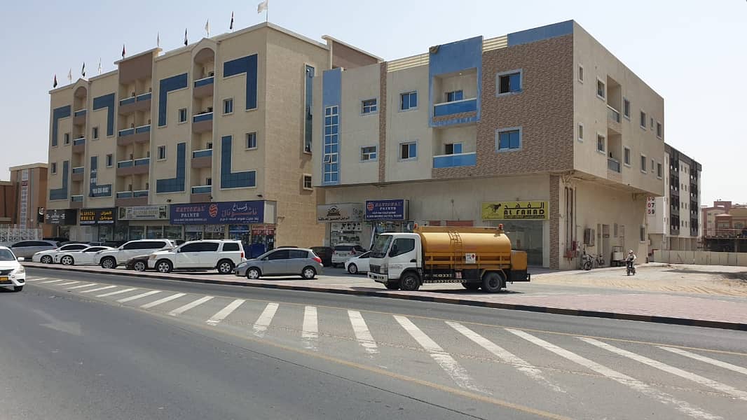 For sale a new building in Al Jurf - Ajman On a street and a railroad - with an INCOME 498 K
