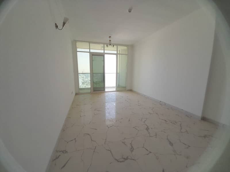 Two-bedroom apartment, annual rent, Oasis Towers, Ajman - distinctive view