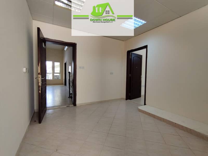 Small 1 Bedroom Hall in Khalifa City with Private Backyard