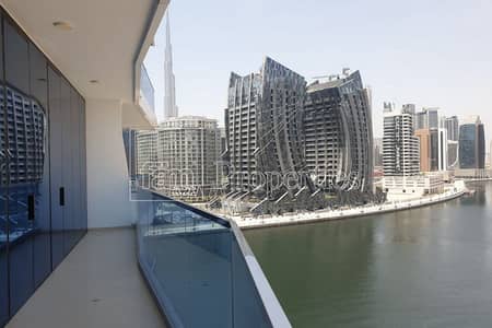 1 Bedroom Flat for Sale in Business Bay, Dubai - Large 1BR w/ Burj Khalifa and Canal views