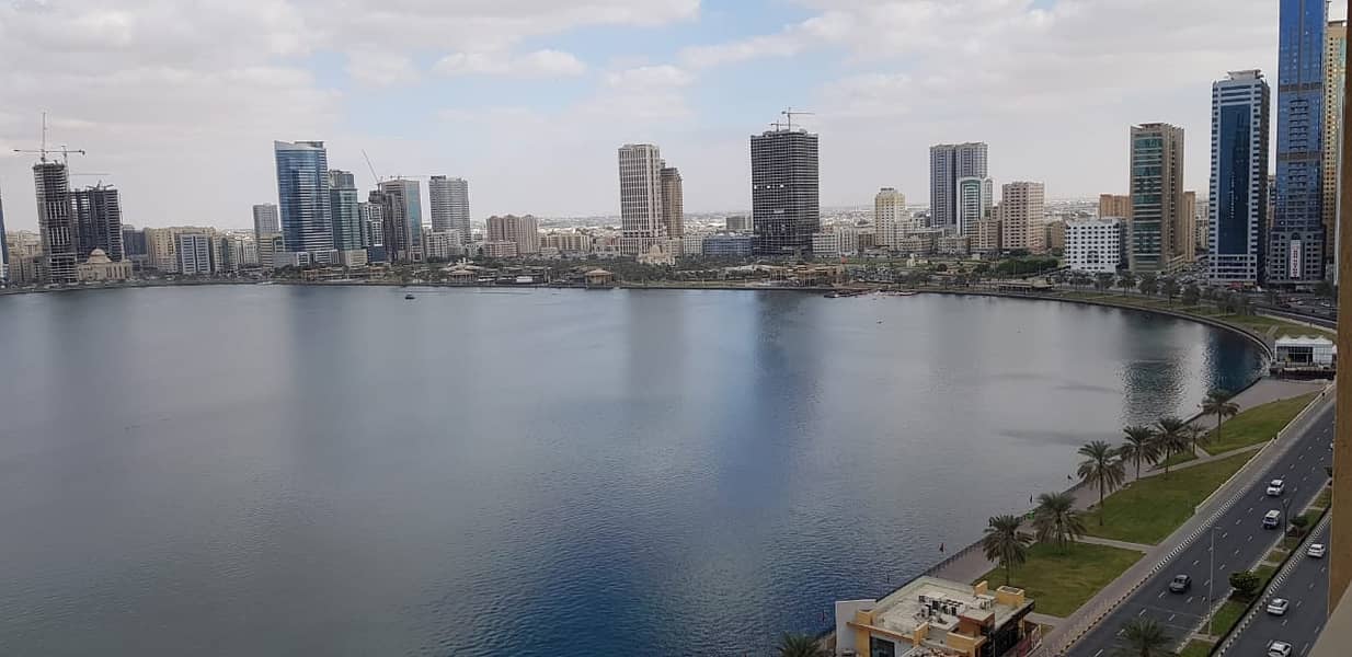 Tower for sale direct from the owner -- Lake view - high income - Al Majaz area - Sharjah