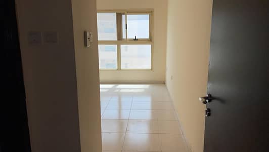 1 Bedroom Flat for Rent in Emirates City, Ajman - SUPER DEAL FOR RENT 1 BED HALL IN LILIES TOWER HIGHER FLOOR WITH PARKING IN GOOD PRICE