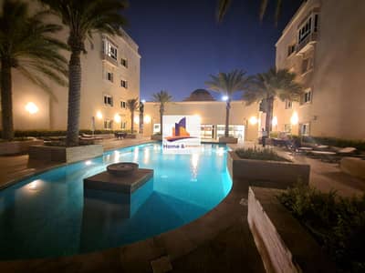 2 Bedroom Flat for Rent in Al Zahraa, Abu Dhabi - Eastern Mangrove Promenade 1 Resort lifestyle with mangrove view | 12 checks.