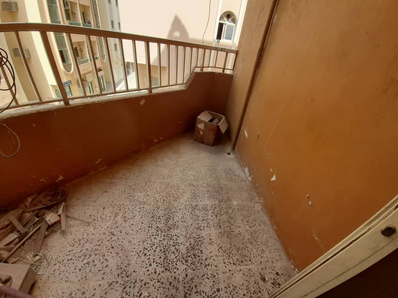 window Ac 1 bhk with balcony in 12 cheques ready to move in al nabba area close to nesto hypermarket