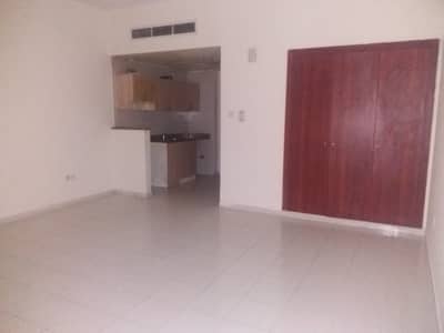Studio for Rent in International City, Dubai - STUDIO WITH BALCONY AVAILABLE IN GREECE CLUSTER YEARLY RENT 20000/-