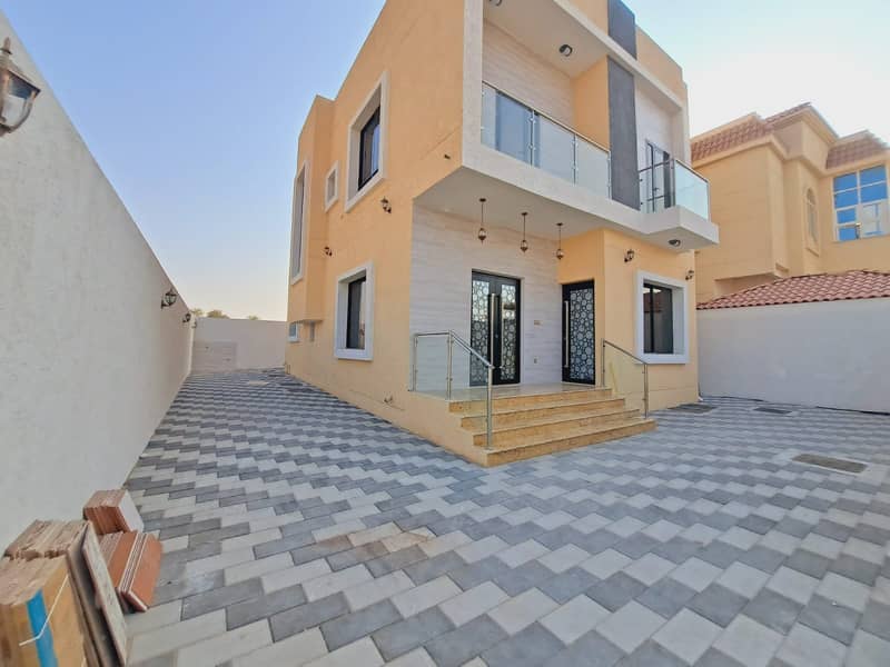 At the price of a snapshot and without down payment, a villa near the mosque, from the most luxurious villas in Ajman, with super deluxe finishes, and