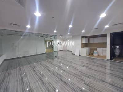 Office for Rent in Jumeirah Village Circle (JVC), Dubai - BRAND NEW FULLY FITTED OFFICE | PRIME LOCATION | PANTRY +WASHROOM | SPACIOUS | ACCESS TO POOL & GARDEN