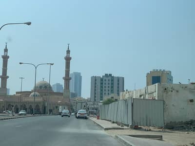 Plot for Sale in Liwara 1, Ajman - For sale commercial residential land on Saif Al Hamrani Main Street