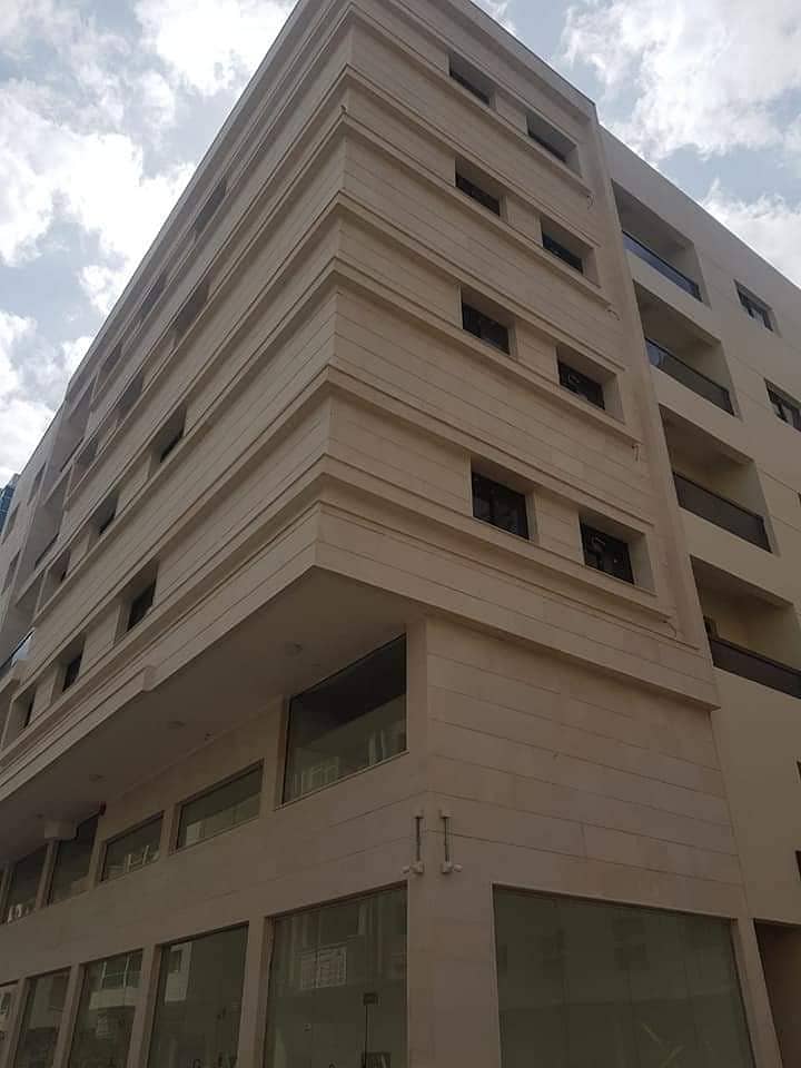 Apartment for annual rent two rooms and a hall in the Emirate of Ajman Al Hamidiyah, an excellent vital location next to Etisalat and passports