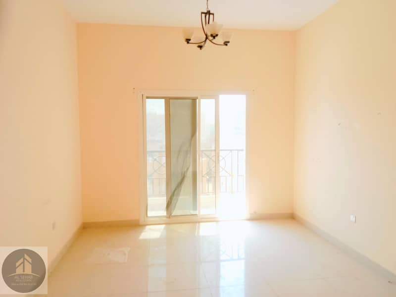 Bright & spacious 1BR apt with balcony in reasonable price ! Easy to dubai exit ! Close to safari mall !Maintenance free