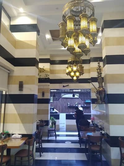 Other Commercial for Rent in Al Nakhil, Ajman - For rent a restaurant with full equipment in a very lively area at an excellent price