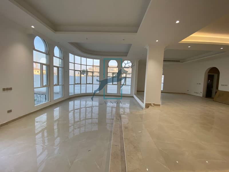 A new 7 master bedroom villa for sale in Khalifa City with large areas.