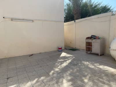 2 Bedroom Villa for Rent in Al Ghafia, Sharjah - A house with a bed for rent