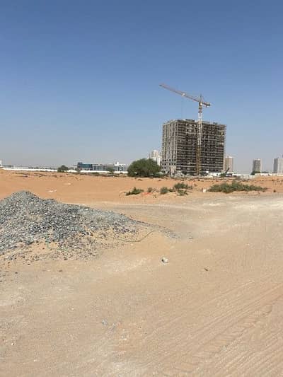 Plot for Sale in Al Amerah, Ajman - Commercial Residential Land for sale with a permit to sell as freehold flats with permit for G + 15