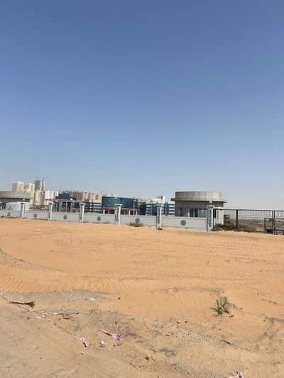 Plot for Sale in Al Amerah, Ajman - Commercial Residential Land for sale with a permit to sell as freehold flats with permit for G + 15