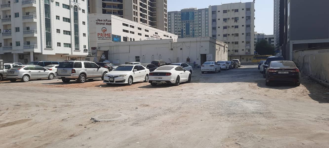 For sale land in Rashidiya3, Third piece of the main street, excellent location corner of three streets