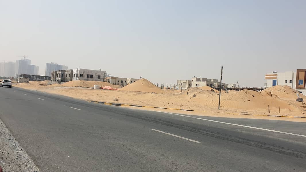 للبيع اراضي تجارية تصريح ارضي  على الشارع الرئيسي الرابط بين شارع الشيخ مكتوم بن راشد ومنطقة الزاهية