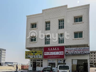 Building for Sale in Al Jurf, Ajman - For sale a commercial building, ground and two floors, in Al Jurf 16 - Emirate of Ajman