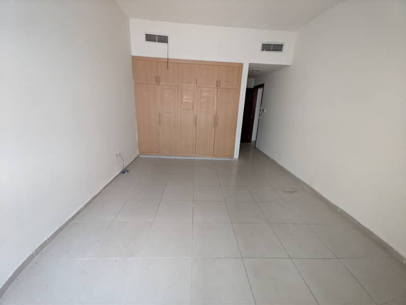 Spacious 1 BHK Apartment with Balcony, Gym, Pool and Wardrobes
