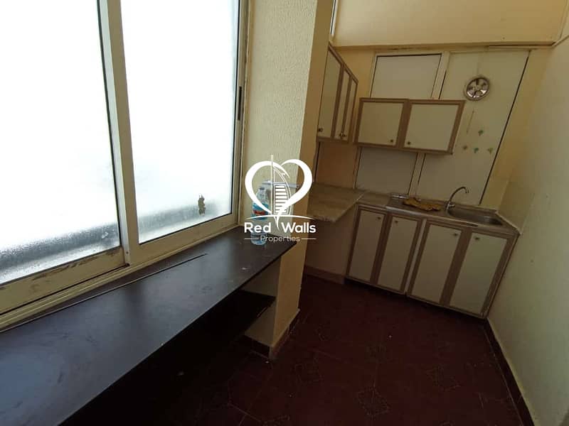 Superb 1 BHK Apartment with Balcony Located in Al Karamah, Parking Available: