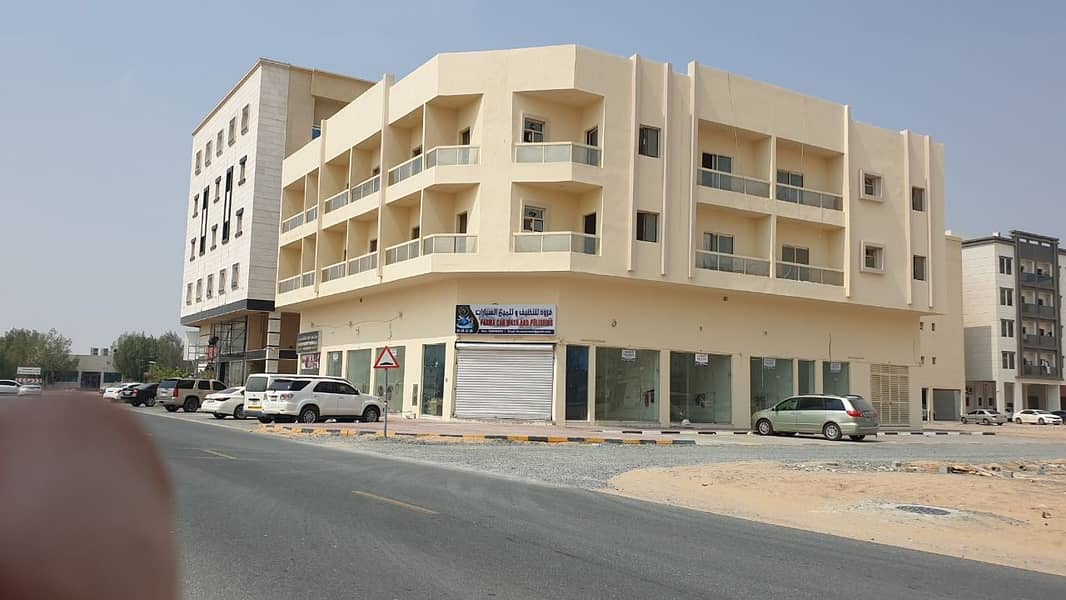 For sale a new building in Al Jurf - Ajman- Good  location -asphalt street near the Chinese market-Freehold
