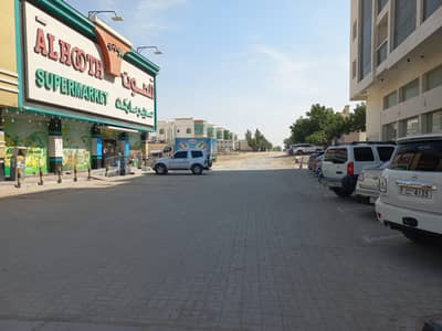 Plot for Sale in Al Mowaihat, Ajman - For sale residential commercial land corner of the street and railway