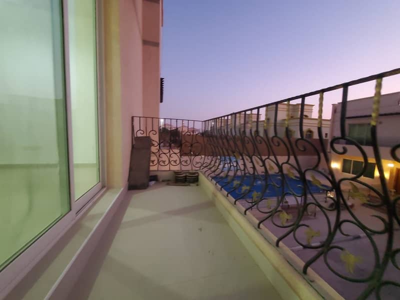 European Community Huge Studio ((Private Balcony )) + Share Pool + Separate Kitchen Close AL Forsan